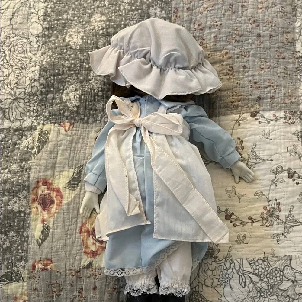 Elegant Blue and White Doll with Bonnet